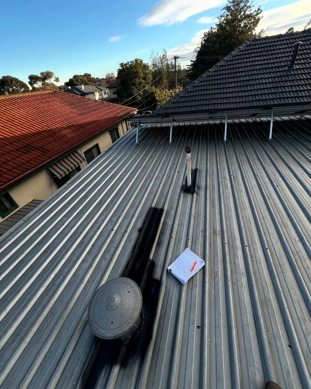 Backtray installed over leaking roof penetrations in Chadstone